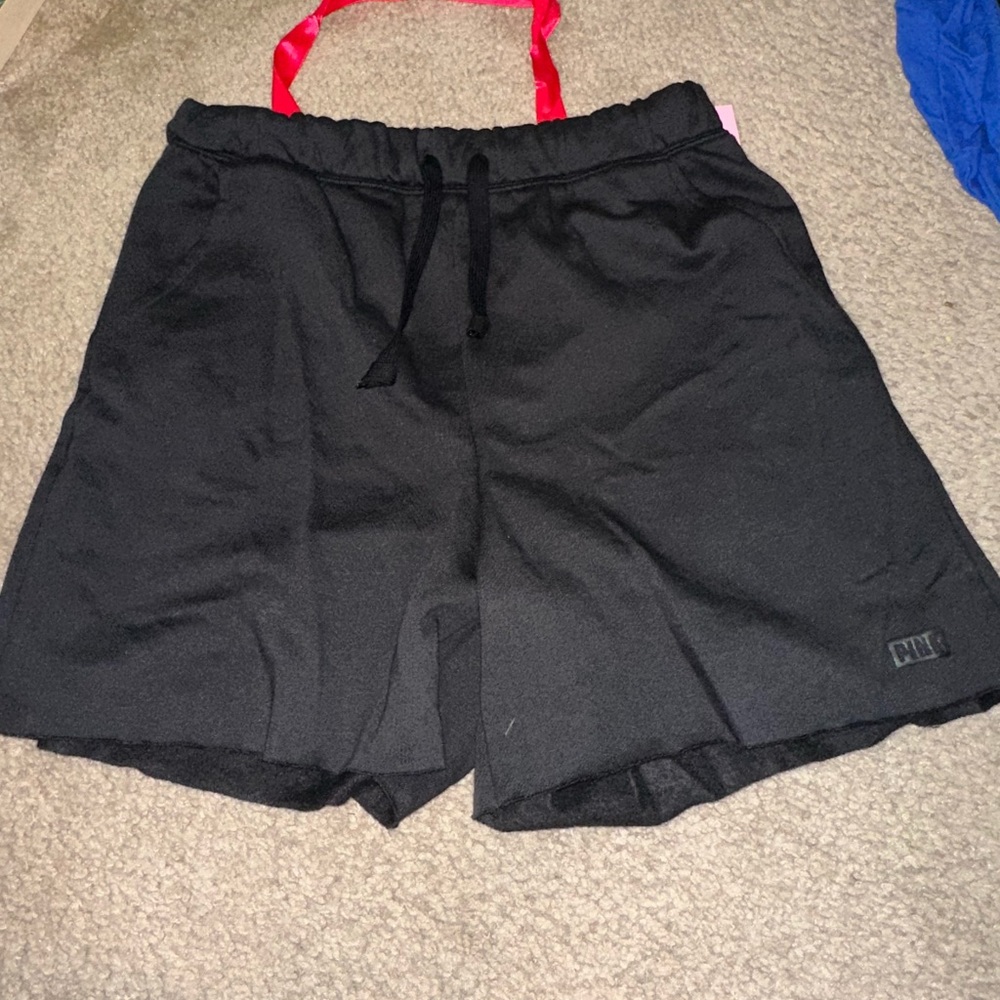 Pink logo dad shorts black and tan are new with tags. Gray is used. - Picture 4 of 10